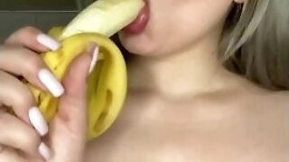 Blonde Licks A Banana With Her Lips